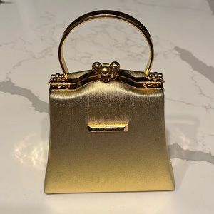 NWOT HEYS gold mini handbag